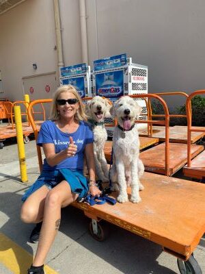 Stacy with her two dogs